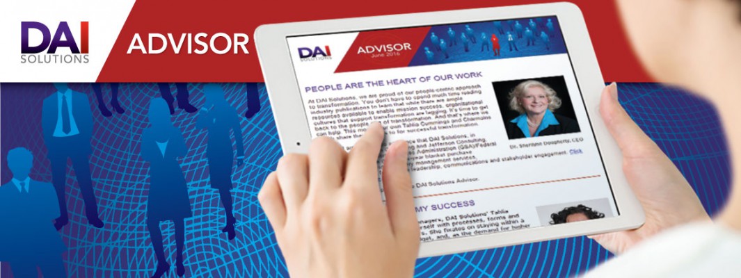 Photo of a tablet with DAI Solutions newsletter displayed