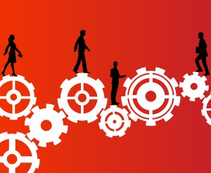 Silhouette image of business people walking over gears